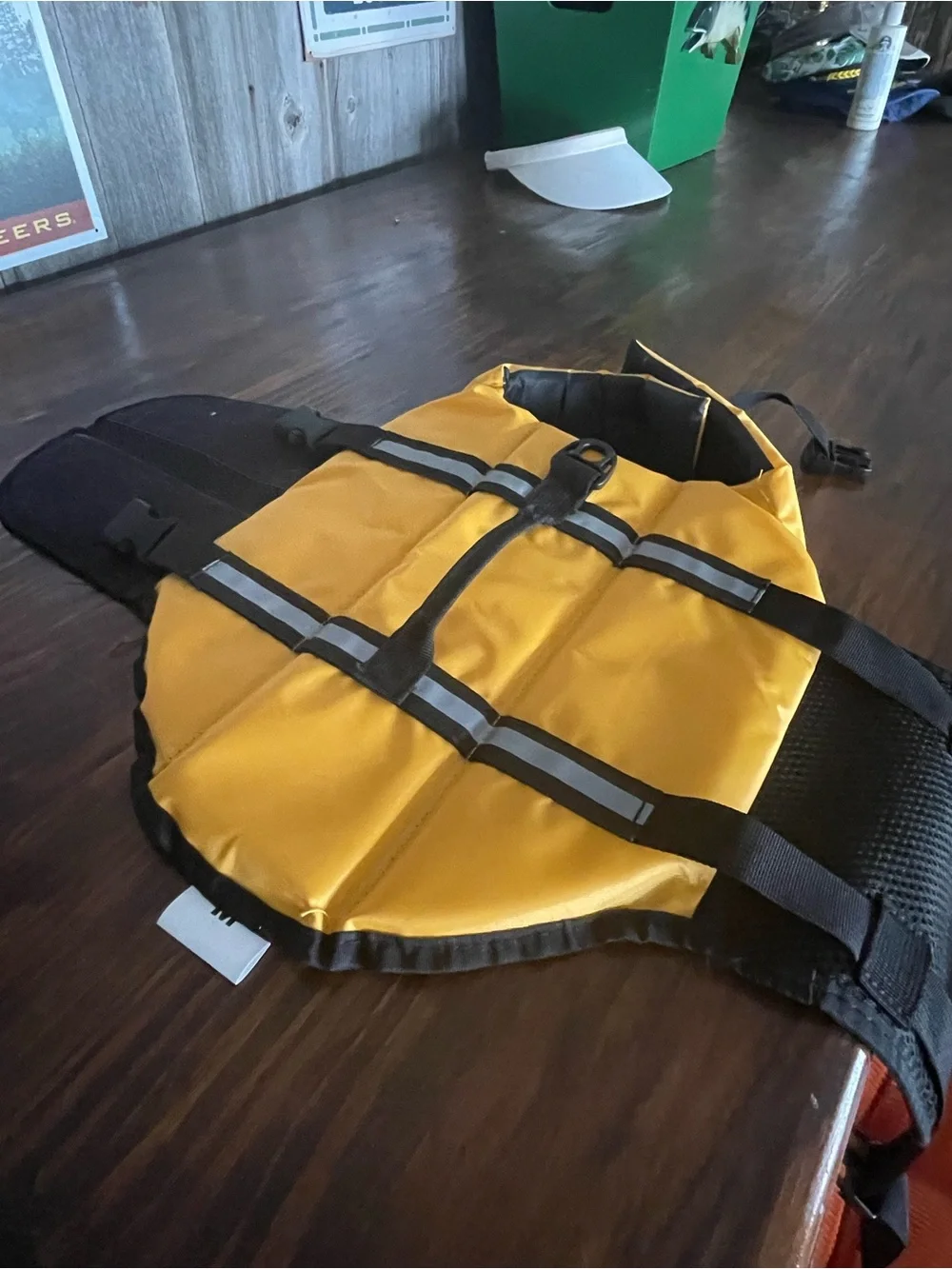 Yellow floatation device for dog